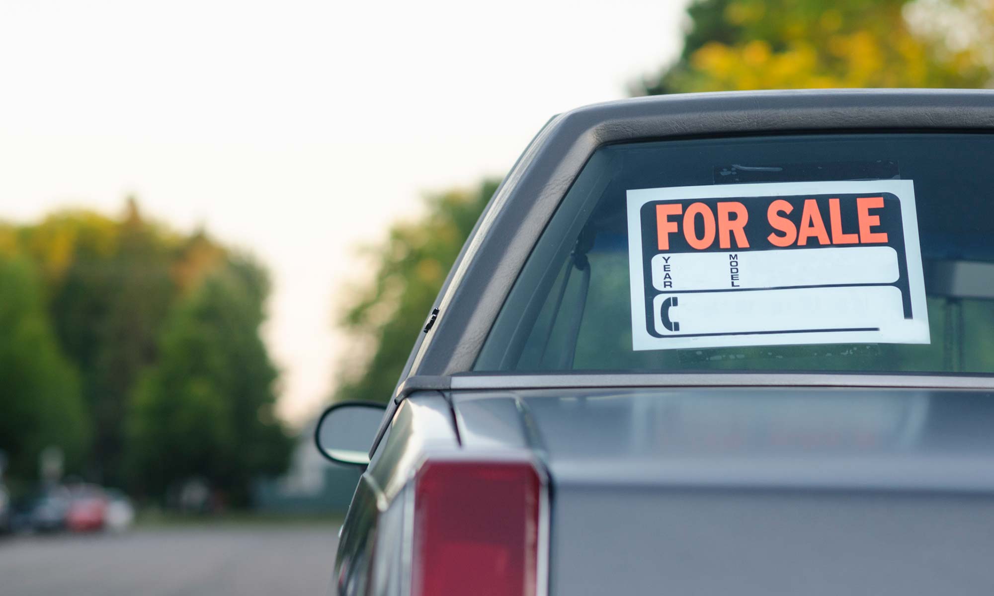 A car parked on the street with a