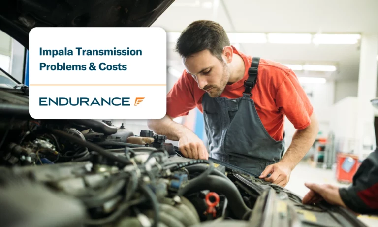 Young auto mechanic working in garage