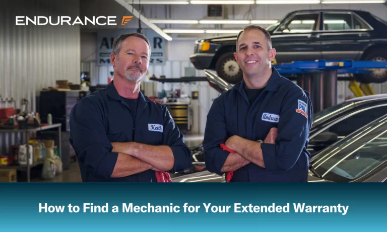Two certified mechanics, Keith Benline and Andrew Giorgi, at a repair shop.