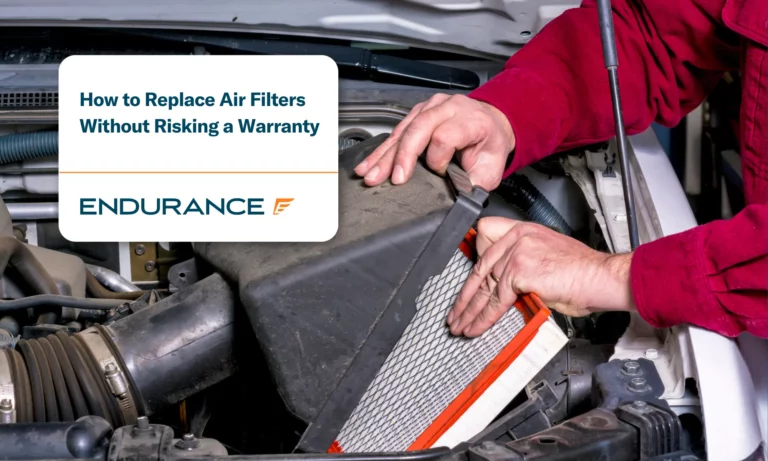 Mechanic replacing a dirty engine air filter