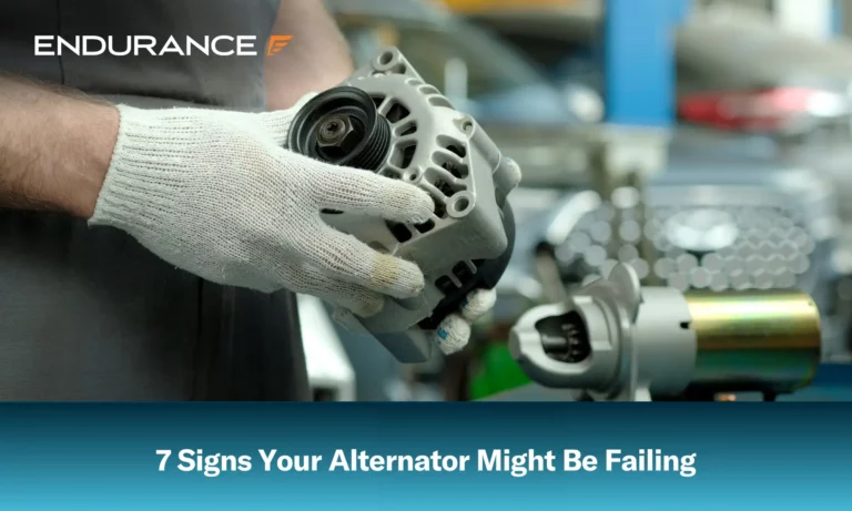 Alternator in the hands of an auto mechanic